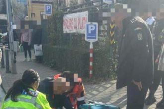 Tanar motociclist ranit la Pitesti ajutat de politisti